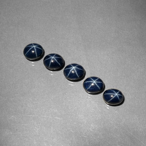  карата, натуральный Темно-синий Звездчатый сапфир, Огранка Овал, Непрозрачный