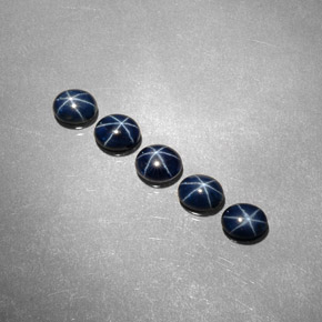  карата, натуральный Темно-синий Звездчатый сапфир, Огранка Овал, Непрозрачный