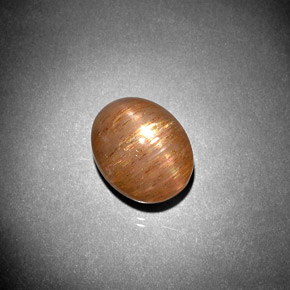 5.57 карата, натуральный Золотисто-коричневый Звездчатый Солнечный Камень, Огранка Овал, Непрозрачный