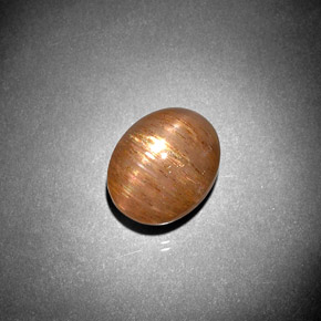 5.57 карата, натуральный Золотисто-коричневый Звездчатый Солнечный Камень, Огранка Овал, Непрозрачный
