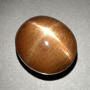 6.93 карата, натуральный Золотисто-коричневый Звездчатый Солнечный Камень, Огранка Овал, Непрозрачный