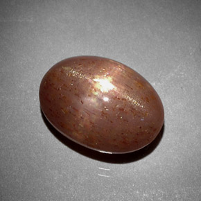 6.85 карата, натуральный Золотисто-коричневый Звездчатый Солнечный Камень, Огранка Овал, Непрозрачный