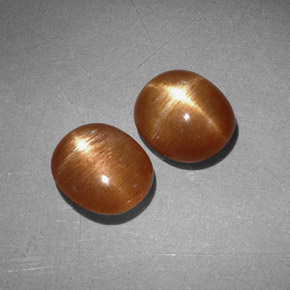  карата, натуральный Золотисто-коричневый Звездчатый Солнечный Камень, Огранка Овал, Непрозрачный