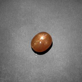 1.19 карата, натуральный Золотисто-коричневый Звездчатый Солнечный Камень, Огранка Овал, Непрозрачный