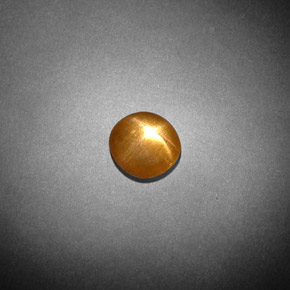 0.85 карата, натуральный Золотисто-коричневый Звездчатый Солнечный Камень, Огранка Овал, Непрозрачный