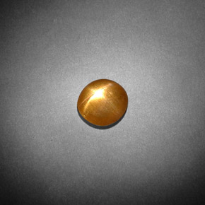 0.85 карата, натуральный Золотисто-коричневый Звездчатый Солнечный Камень, Огранка Овал, Непрозрачный