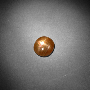 0.85 карата, натуральный Золотисто-коричневый Звездчатый Солнечный Камень, Огранка Овал, Непрозрачный