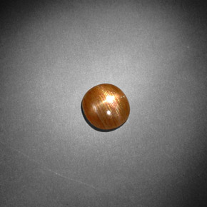 0.85 карата, натуральный Золотисто-коричневый Звездчатый Солнечный Камень, Огранка Овал, Непрозрачный