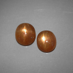  карата, натуральный Золотисто-коричневый Звездчатый Солнечный Камень, Огранка Овал, Полупрозрачный