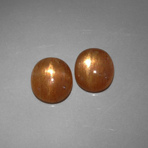  карата, натуральный Золотисто-коричневый Звездчатый Солнечный Камень, Огранка Овал, Полупрозрачный