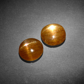  карата, натуральный Золотисто-коричневый Звездчатый Солнечный Камень, Огранка Овал, Непрозрачный