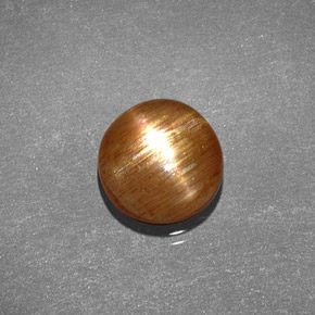 1.35 карата, натуральный Золотисто-коричневый Звездчатый Солнечный Камень, Огранка Овал, Непрозрачный