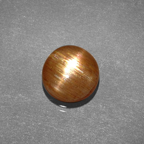 1.35 карата, натуральный Золотисто-коричневый Звездчатый Солнечный Камень, Огранка Овал, Непрозрачный