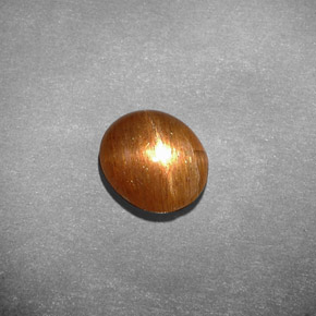 1.55 карата, натуральный Золотисто-коричневый Звездчатый Солнечный Камень, Огранка Овал, Непрозрачный