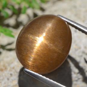 9.02 карата, натуральный Средне-светло-коричневый Звездчатый Солнечный Камень, Огранка Овал, Непрозрачный