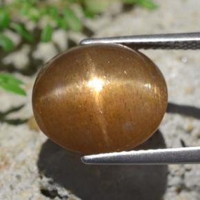 9.02 карата, натуральный Средне-светло-коричневый Звездчатый Солнечный Камень, Огранка Овал, Непрозрачный