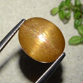 5.86 карата, натуральный Золотисто-коричневый Звездчатый Солнечный Камень, Огранка Овал, Непрозрачный