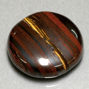 Натуральный многоцветный tiger's eye matrix 31,63 карата огранка круг, непрозрачный