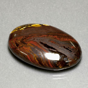 Натуральный многоцветный tiger's eye matrix 35,49 карата огранка овал, непрозрачный