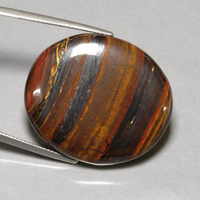 Натуральный многоцветный tiger's eye matrix 53,09 карата огранка овал, непрозрачный