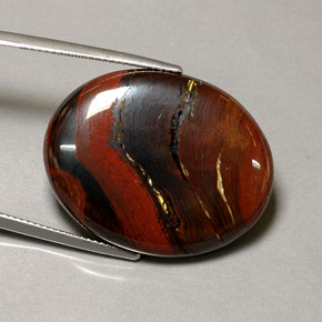 Натуральный многоцветный tiger's eye matrix 41,60 карата огранка овал, непрозрачный