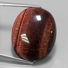 Натуральный многоцветный tiger's eye matrix 40,06 карата огранка овал, непрозрачный