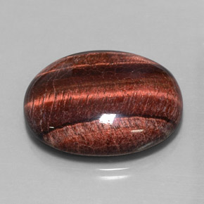 Натуральный многоцветный tiger's eye matrix 40,06 карата огранка овал, непрозрачный