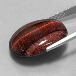 Натуральный многоцветный tiger's eye matrix 40,06 карата огранка овал, непрозрачный