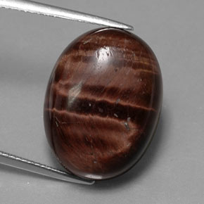 Натуральный многоцветный tiger's eye matrix 21,49 карата огранка овал, непрозрачный