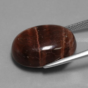 Натуральный многоцветный tiger's eye matrix 21,49 карата огранка овал, непрозрачный