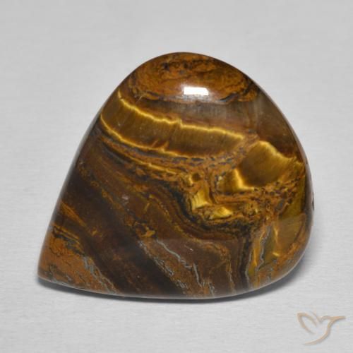 Драгоценный камень тигровый глаз огранки «груша» 24,22 карат