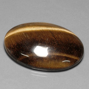 Натуральный коричневый tiger's eye 78,03 карата огранка овал, непрозрачный
