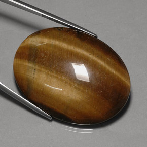 Натуральный коричневый tiger's eye 75,77 карата огранка овал, непрозрачный
