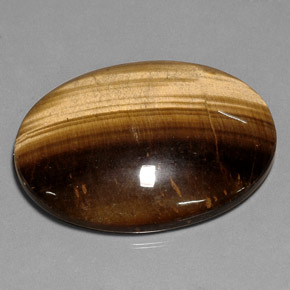 Натуральный коричневый tiger's eye 75,05 карата огранка овал, непрозрачный