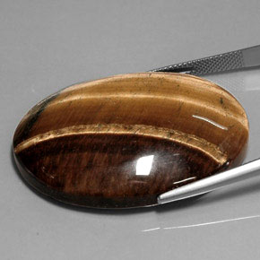 75.54 карата, натуральный Золотисто-коричневый Тигровый глаз, Огранка Овал, Непрозрачный