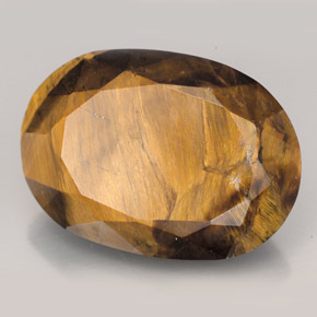 Натуральный коричневый tiger's eye 23,17 карата огранка овал, непрозрачный