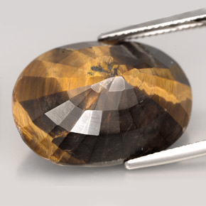 Натуральный коричневый tiger's eye 23,17 карата огранка овал, непрозрачный