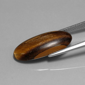 10.15 карата, натуральный Золотисто-коричневый Тигровый глаз, Огранка Овал, Непрозрачный