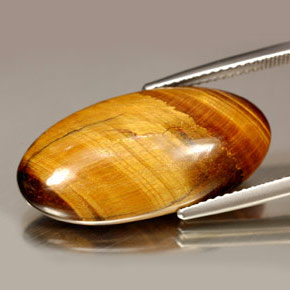 14.67 карата, натуральный Золотисто-коричневый Тигровый глаз, Огранка Овал, Непрозрачный