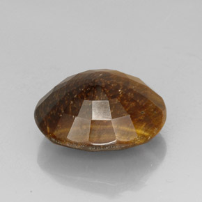 Натуральный коричневый tiger's eye 25,78 карата огранка овал, непрозрачный