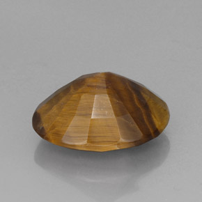 Натуральный коричневый tiger's eye 14,10 карата огранка овал, непрозрачный