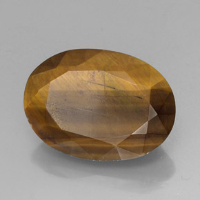 Натуральный коричневый tiger's eye 18,43 карата огранка овал, непрозрачный