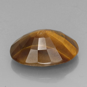 Натуральный коричневый tiger's eye 18,43 карата огранка овал, непрозрачный