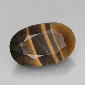 Натуральный многоцветный tiger's eye 13,19 карата огранка овал, непрозрачный