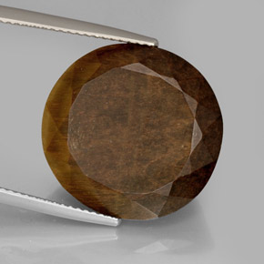 Натуральный коричневый tiger's eye 20,85 карата огранка овал, непрозрачный