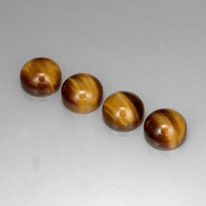 Натуральный коричневый tiger's eye  карата огранка круг, непрозрачный