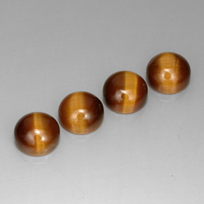 Натуральный коричневый tiger's eye  карата огранка круг, непрозрачный