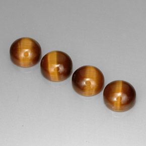 Натуральный коричневый tiger's eye  карата огранка круг, непрозрачный
