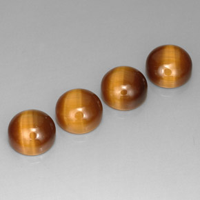 Натуральный коричневый tiger's eye  карата огранка круг, непрозрачный