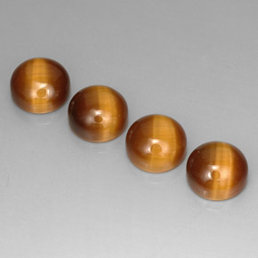 Натуральный коричневый tiger's eye  карата огранка круг, непрозрачный